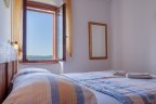 1_Bedroom-bed-window
